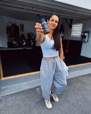 Ariane Lipski Instagram - On my way to another S&C session but I can’t forget my NMN 😉

I can only take the best, most trusted supplements. 
That’s why I use NMN from @genetic_labs_aus 

➡️ It helps my muscles repair faster and keeps me at my peak