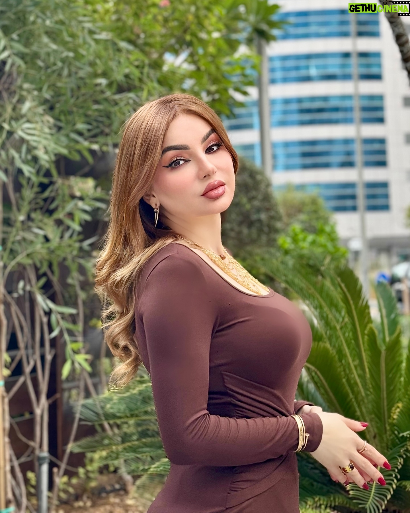 Ban Adnan - 7.2K Likes - بني شوكولاتة🤎🤎🤎🤎🤎 Boot: @zara bag: @maisonvalentino dress: @shein_ar