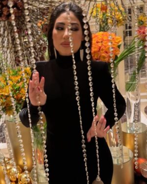 Boussy Instagram - 🖤🪩

Jumpsuit: @alexandrevauthier 
Boot: @paristexas_it 
MUA: @amiraelmalky 
Hair: @shreframadan 
Photo: @ramy_wadeea
