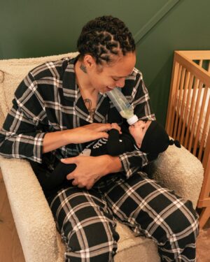 Brittney Griner Instagram - Bash may have the best room in the house. Thank you @strolleria for providing the most comfortable nursing chair and stroller. Relle and I both fall asleep with Bash at night in that chair and wake up without any aches and pains! That’s a plus in my book! @crateandkids proud to partner with you in designing Bash’s room! We love every detail from his amazing book wall collection to his comfortable crib! He sleeps like a big man in his room alone 💤 #strolleriapartner #crateandkidspartner #ilovemystrolleria #ilovemycrateandkids