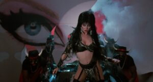 Cassandra Peterson Instagram - @juliens_auctions will hold it’s “HOLLYWOOD LEGENDS: SCI-FI, HORROR, & ACTION” Auction on December 12th 2024 at 10am. Included in the auction is this piece – the large (approx. 8’x12’) banner of my eyes that I burst through during the final scene of Elvira, Mistress of the Dark, while riding on the hood of my Macabre Mobile. Only 2 were made, the one that was destroyed in the movie and this identical backup banner. Now’s your chance to own a little (or should I say BIG) piece of me! 👁️ 👁️ (Auction link in bio)