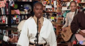 Doechii Instagram - Thank you @nprmusic for such an intimate experience. 

Thank you to my gifted band and MD for curating the vibessss

Alligator Bites Never Heal Tiny Desk experience is on YouTube now 🐊

MD: @slimwav
DJ: @djmissmilan 
drums: @dee.sim1 
bass: @zuriapplebass 
guitar: @tyleronguitar 
keys: @hammondgal 
trumpet: @ttatemusic 
sax: @kpottermusic 
vox: @itsbrennae 
vox: @emmani