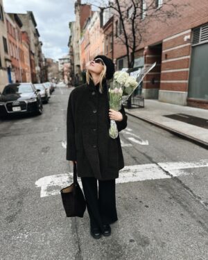 Emily Wickersham Instagram - Still cold, still out here, still smelling the roses (hydrangeas and tulips), happy 2025!