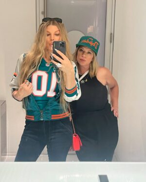Fergie Instagram - still basking in the glow of monday nights win🐬🐬🏈🏈 #finsup