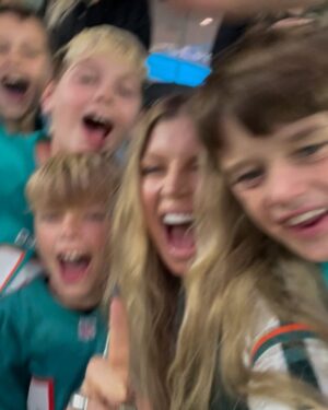 Fergie Instagram - still basking in the glow of monday nights win🐬🐬🏈🏈 #finsup