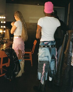 Haley Tju Instagram - Jada and Coy on film, backstage at THRPYFEST 

Huge thanks to @Saintphace and @Calyxclothing for making custom pieces for this performance 🖤

Styled by: Haley Tju

Jada’s Outfit 
Custom Skirt: @CalyxClothing
Jacket & Shorts: @Purgatory
Necklace: @AlyxStudio
Shirt: @604service
Boots are Vintage 

Coy’s Outfit 
Custom Jeans: @Saintphace
Jacket: @Saintphace
Gloves: @erl
Shirt: @Purgatory
