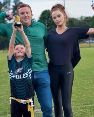 Kathryn Dennis Instagram - When your kiddo nails a touchdown and busts out the Madden victory dance. 🕺🏈 Proud mom with my little champ and his biggest fans. #MaddenMoves #FlagFootballFun