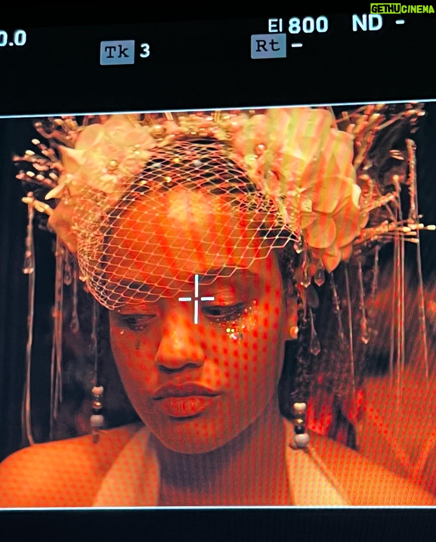 Kiersey Clemons - 3 Likes - When I read The Young Wife script I saw Celestina with glitter tear drops on the day of her non-wedding wedding reflecting the mask she feels the pressure to wear carrying the weight of the inevitable future. I listened to a lot of Leon Bridges who plays my soon to be husband. I heard Tout Fout L’camp at a clown show in Montreal in 2019. I listened to it before most scenes. Tout Fout L’camp translates to “Everything’s falling apart!!” Sheryl Lee Ralph, who plays my mom spoke French in the movie and I imagined Celestina yelling the song with her mother when things weren’t so great - they’d end up falling into laughter. Celly went on to share it with Cookie played by Judith Light. They’d sing, scream and laugh. Jumatatu led us in a dance to this song after I played it for Tayarisha - our prompt was what is a song that describes your character?