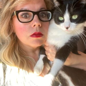 Kirsten Vangsness Instagram - The most magical, cosmic and magnificent of creatures known at Atreyu left the planet yesterday. I am the kind of horrible sad that comes from feeling the most beautiful kind of love. I will forever be astonished at how cute their stretched out paws could be. Let us all breathe in how glorious it is to love and be loved by creatures. PS That final picture was literally taken the evening that David Bowie left the planet. Atreyu rubbed their body against some chalk on the chalkboard wall I have. It was the only time it ever happened and further proof of his magic by being cat #alladinsane