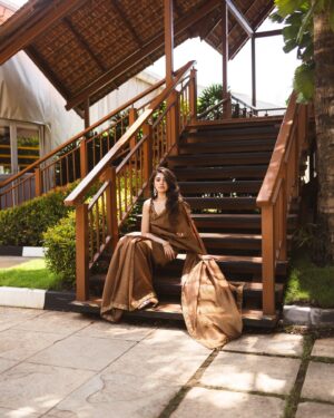 Krithi Shetty Instagram - That #goldenhour glow 🔥
•
Saree @mimamsaa 
Styling @mayzaideh_khalid 
Draping @sareedrapesbymekha 
Glam @laxmi_saneesh 
Photographer @premsampaul