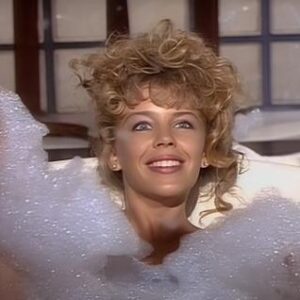 Kylie Minogue Instagram - I Should Be So Lucky, lucky, lucky, lucky, lucky, WAIT!!! How many times do I sing ‘Lucky’ in ISBSL. For its 37th birthday I’m going to find out. Please hold …

Won’t be long …

Wow, there’s a lot of them ….

GOT IT 🎉 Just a lazy 57 times 🤯😬💖 Happy Birthday to the song that took me around the 🌎 and then some!