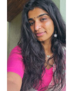 Lisha Chinnu Instagram - Sometimes, all you need is a pop of pink and a touch of desi flair to feel connected, no matter where you are!”