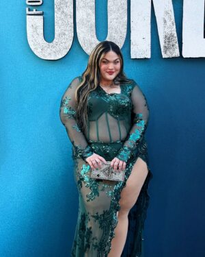 Loey Lane Instagram - Can I be honest??? I almost didn’t wear this dress last night. 
Don’t get me wrong, I LOVE this outfit - I ordered it specifically for the Joker: Folie à Deux premiere! But I was staring at myself in the mirror right before I walked out the door, and a familiar little voice crept into my head.
Telling me that I should cover up. To wear something plainer, something less attention-grabbing. This dress suddenly felt like too much, *I* felt like too much -
And you know what I did?
I put on my heels, walked out the door, and got in my car.
So often I think people assume that to be confident you have to be a specific kind of person, or at a place in your life where you feel good about yourself all the time. But for me, those negative thoughts still creep into my head sometimes. I’m not saying it’s everyone’s experience - but I definitely still experience self doubt, even in moments where I may not look like it.
It’s okay to think those things. It’s okay to listen. But you owe it to yourself to say, “alright, brain, I hear ya. But we also have one life to live, and I’m not spending it hiding away from other people’s opinions of me.”

I got so many compliments on my outfit from beautiful, lovely people all night long. Who didn’t see me the way I saw myself in the mirror before I left the house, but as I truly am. Happy and confident in my own skin, playing dress up to go to the movies.
Just put on the dress, or the crop top, or the baggy pants. Life is too short to hide away from the opinions of other people. All that matters is what you think about yourself, and when you show up and give yourself a chance to practice confidence, I promise it will come easier to you. Love you. 💓
#plussize #ootd #plussizefashion #bodypositivity #bodyconfindence #joker
