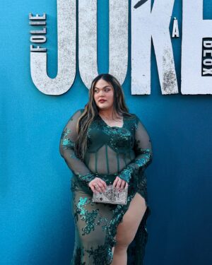 Loey Lane Instagram - Can I be honest??? I almost didn’t wear this dress last night. 
Don’t get me wrong, I LOVE this outfit - I ordered it specifically for the Joker: Folie à Deux premiere! But I was staring at myself in the mirror right before I walked out the door, and a familiar little voice crept into my head.
Telling me that I should cover up. To wear something plainer, something less attention-grabbing. This dress suddenly felt like too much, *I* felt like too much -
And you know what I did?
I put on my heels, walked out the door, and got in my car.
So often I think people assume that to be confident you have to be a specific kind of person, or at a place in your life where you feel good about yourself all the time. But for me, those negative thoughts still creep into my head sometimes. I’m not saying it’s everyone’s experience - but I definitely still experience self doubt, even in moments where I may not look like it.
It’s okay to think those things. It’s okay to listen. But you owe it to yourself to say, “alright, brain, I hear ya. But we also have one life to live, and I’m not spending it hiding away from other people’s opinions of me.”

I got so many compliments on my outfit from beautiful, lovely people all night long. Who didn’t see me the way I saw myself in the mirror before I left the house, but as I truly am. Happy and confident in my own skin, playing dress up to go to the movies.
Just put on the dress, or the crop top, or the baggy pants. Life is too short to hide away from the opinions of other people. All that matters is what you think about yourself, and when you show up and give yourself a chance to practice confidence, I promise it will come easier to you. Love you. 💓
#plussize #ootd #plussizefashion #bodypositivity #bodyconfindence #joker