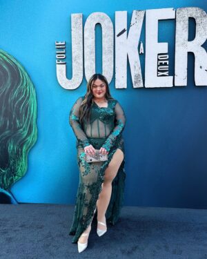 Loey Lane Instagram - Can I be honest??? I almost didn’t wear this dress last night. 
Don’t get me wrong, I LOVE this outfit - I ordered it specifically for the Joker: Folie à Deux premiere! But I was staring at myself in the mirror right before I walked out the door, and a familiar little voice crept into my head.
Telling me that I should cover up. To wear something plainer, something less attention-grabbing. This dress suddenly felt like too much, *I* felt like too much -
And you know what I did?
I put on my heels, walked out the door, and got in my car.
So often I think people assume that to be confident you have to be a specific kind of person, or at a place in your life where you feel good about yourself all the time. But for me, those negative thoughts still creep into my head sometimes. I’m not saying it’s everyone’s experience - but I definitely still experience self doubt, even in moments where I may not look like it.
It’s okay to think those things. It’s okay to listen. But you owe it to yourself to say, “alright, brain, I hear ya. But we also have one life to live, and I’m not spending it hiding away from other people’s opinions of me.”

I got so many compliments on my outfit from beautiful, lovely people all night long. Who didn’t see me the way I saw myself in the mirror before I left the house, but as I truly am. Happy and confident in my own skin, playing dress up to go to the movies.
Just put on the dress, or the crop top, or the baggy pants. Life is too short to hide away from the opinions of other people. All that matters is what you think about yourself, and when you show up and give yourself a chance to practice confidence, I promise it will come easier to you. Love you. 💓
#plussize #ootd #plussizefashion #bodypositivity #bodyconfindence #joker