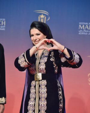 Mounia Lamkimel Instagram - @marrakechfilmfestival 
مع العمر @naamanadil 

حطيت الالبوم لي وصلني كااامل حيث ماعرفتش شنو نختار🫣 شكرا بزاااااف @tendancevision 
بغيت نقول شكرا لادارة المهرجان على حفاوة الاستقبال شكراً للاعلام المغربي على التتبع والمساندة 🇲🇦♥️
شكرا العزيزة الغالية @zor.creations  على اللبسة الهماوية لي تمتعت وانا لابساها ورغم الظروف الصحية والانشغالات إلا انك كنتي متمكنة من حرفتك ولبستيني أنا وعادل على أكمل وجه
شكرا من القلب اخويا وصديقي المتميز @halim_barakat_official لي ماكنتيق إلا فيه ولي شرف على الماكياج والشعر فوقت خرااافي وعطى نتيجة حبييييييتها😌♥️
