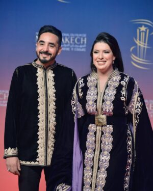 Mounia Lamkimel Instagram - @marrakechfilmfestival 
مع العمر @naamanadil 

حطيت الالبوم لي وصلني كااامل حيث ماعرفتش شنو نختار🫣 شكرا بزاااااف @tendancevision 
بغيت نقول شكرا لادارة المهرجان على حفاوة الاستقبال شكراً للاعلام المغربي على التتبع والمساندة 🇲🇦♥️
شكرا العزيزة الغالية @zor.creations  على اللبسة الهماوية لي تمتعت وانا لابساها ورغم الظروف الصحية والانشغالات إلا انك كنتي متمكنة من حرفتك ولبستيني أنا وعادل على أكمل وجه
شكرا من القلب اخويا وصديقي المتميز @halim_barakat_official لي ماكنتيق إلا فيه ولي شرف على الماكياج والشعر فوقت خرااافي وعطى نتيجة حبييييييتها😌♥️