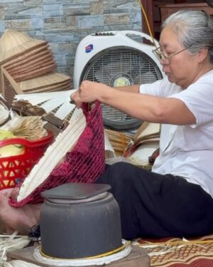 Nazanin Amiri Instagram - Workshop for making Vietnamese hats in one of the villages of Vietnam 🇻🇳(part 1 )location (Chuong hat village)
The process of making traditional Vietnamese conical hats (known as “Non La”) involves several steps:

1. **Material Collection**: Palm leaves or bamboo are used for the structure, and natural or synthetic thread for binding.

2. **Drying**: Leaves are dried to ensure they can be shaped and are durable.

3. **Base Preparation**: A bamboo or wooden ring forms the base of the hat.

4. **Weaving and Binding**: The dried leaves are woven around the base, often using thread to secure them.

5. **Shaping**: The hat is carefully shaped to ensure it fits properly and is symmetrical.

6. **Decoration**: Sometimes decorative elements like fabric or colored threads are added.

7. **Final Touches**: The hat is checked for quality, ensuring it’s both functional and visually appealing.

These hats are lightweight, protective, and a significant cultural symbol in Vietnam.
@nazaninamiri_official 
#vietnam #culture