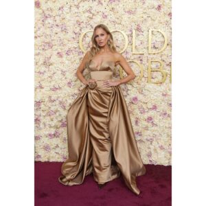 Nikki Glaser Instagram - And it begins… @goldenglobes 

Styled by: @daniandemmastyle 
Hair: @xtinameneses 
Makeup: @jennakristina 
Tan: @dolceglow 
Dress Custom @prabalgurung
Shoes @giuseppezanotti 
Jewelry @buccellatimilan 
Bag @juidithleiberny