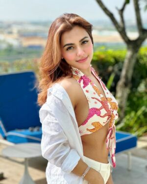 Nusraat Faria Instagram - "Messy hair, glossy stare, and a whole lot of ‘I know I’m fabulous’ energy!"

Hair color by @signature.look.by.samia 
Top by @dotdofficial