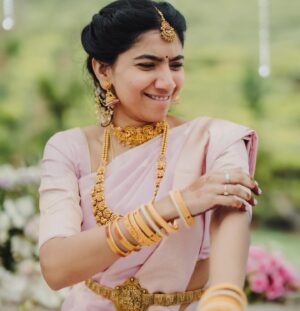 Pooja Kannan Instagram - This is a post for 3 very important and special people - Preeti , Sunita and Siddhi. The one thing I was nervous about from the beginning was my make up and hair because I am someone who has always held myself back due to fear of over doing it.  I would never feel like myself when I have make up or a different hairstyle and used to be extra conscious. But Sunita and Preeti were both saviours . They made me feel beautiful like never before. Though I had make up and a different hair do for all the events , I did not feel extra conscious and felt like different versions of me and was pampered during the process 🙈 Without them by my side, I would not have been able to be at ease during the most important event of my life. Thank you so much @preetisharma_mua and @sunita_hair !! ❤️

Though I don’t have a picture with @siddhi_p17 , thank you so much for helping Pallavi find the right outfits for me and I loved what you did with my reception saree! ❤️

@vivekkrishnanphotography