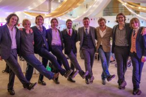 Sarah Beeny Instagram - The @kingsfdn at @dumfrieshouse host monthly tea dances to bring together members of the local community at risk of loneliness or isolation to socialise while enjoying live music and an afternoon tea. 

When I visited @dumfrieshouse I was bowled over by how much care and professionalism the staff put into these dances, and so inspired. 

I am so grateful to the incredible Royal butlers, Evan and Gavin who helped us to host a similar event, the most joyous event I have ever had the privilege to host. 
Thank you so so much Evan, Gavin, @dumfrieshouse @kingsfdn and the wonderful @ageuksom team who trusted us with their 75th Anniversary party and to look after such precious guests. 
I don’t often say this and probably should say it more - thank you @the_entitled_sons ❤️xxxx. If you missed it, catch up on @channel4 #sarahbeenynewlife