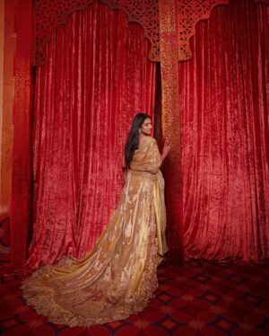 Shereen Sikka Instagram - Radhika Ambani for her Reception in @dolcegabbana Alta Moda Sardegna 2024 and custom @anamikakhanna.in Couture. 
Footwear @aprajitatoorofficial 
Styled with @rheakapoor @sanyakapoor
Glam @bbhiral @loveleen_makeupandhair 
Draped by @dolly.jain 
Style team @meghnadhall @styledbysujata 
@stylebyvanshika 

Pictures by @gregswalesart