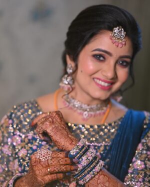 Srithika Instagram - “Every stitch tells a story ✨ Intricately hand-crafted bridal lehenga for the radiant Bride @srithika_saneesh where tradition meets timeless elegance. 
.
💖 #BridalDreams #HandcraftedElegance”
.
Designer: @kayalkumaran 
Bangles: @unikpondicherry 
MuA: @kalaiartistry 
Decor: @kr_decors 
Flowers: @reesribridalflowers 
Photography: @greenfhy_studio