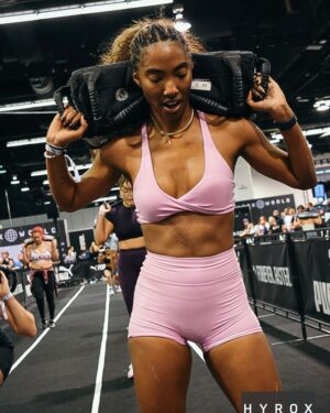 Taylor Hale Instagram - Yup, that’s me. I bet you’re wondering how I ended up here. 

I’ve spent years talking about how I can’t run a single mile. Three months ago, it hit me - I turn 30 on the last day of the year. I am of perfectly able body and mind - the joke of not running a mile actually isn’t cute. 

So there I was, scrolling the clock app. RunTok somehow turned into HyroxTok, and before I knew it I was a package of personal training sessions and new gym membership deep - and on the waitlist for Anaheim Hyrox. I could run a single mile, so how hard could 8K and a few workouts in between be?

Delusion and confidence will take you far! After 3 months of training (and a last minute all-nighter and 5AM flight,) I walked into the Anaheim convention center in my bubblegum pink set. 

My goal was to finish under two hours. I clocked in at 2:02. Special shoutout to the extra lap I ran that was almost exactly…2 minutes. 

As hard as I am on myself, I can’t call this a failure. For a jet-lagged, sleep deprived, inactive first timer: this isn’t so bad. 

What’s most important isn’t the accomplishment of finishing alone. It’s that on a random Fall day I decided to do something completely foreign, and I saw it through to the end. I’m physically and mentally stronger, I’m confident in ways I’ve never been before in the gym, and I truly feel like I can take on any challenge thrown my way. 

So there it is. Best body by 30 wasn’t just an aesthetic push. It was a full blown commitment to getting reacquainted with my body as it says hello to a new stage of life 🤗

@hyroxamerica …got any tickets for Vegas? I’m looking for a doubles partner 😅

#hyrox #gym #motivation