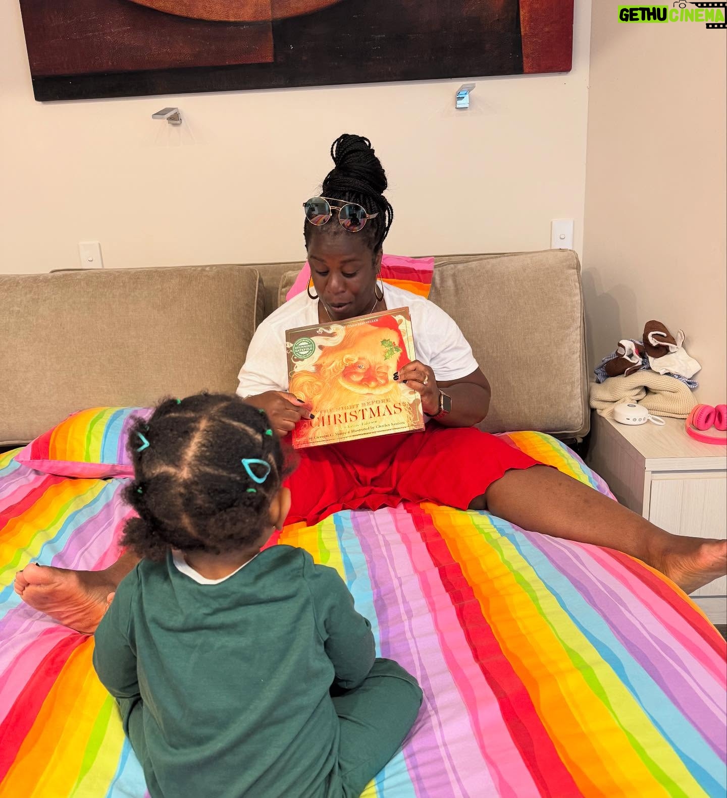 Uzo Aduba - 22.4K Likes - This week’s #RoadToReading is special. It’s “The Night Before Christmas” by Clement C. Moore. I carried this gift from her “Big Aunty,” my sister, Onyi (@ceou117 ) all the way with us on our trip.
She gifted it to each of her new nieces and nephews and this is the first year Adaiba understands books!
I want to start a tradition of reading it to her each Christmas Eve, for as long as she’ll let me 🥹. This is what I love about the holidays: family time, togetherness, traditions. I hope this is a moment she comes to treasure as much as I am treasuring beginning it.
“Welcome, Christmas while we stand. Heart to heart and hand in hand.” -Dr. Seuss 🎄❤️