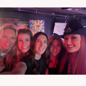 Wynonna Judd Instagram - Camera roll crumbs from 2024. Looking back with a grateful heart!!! 

1- Got to play in Alaska again 🩵
2- Married off the final Moser son 💍
3- The best group to be stuck in an airport with ✈️
4- Sparkles. Duh. ✨
5- Meet Moonshine! 🐮 Kaliyah loves giving him treats!
6- BTS 📸
7- @starletjudd is a really good sport 💕
8- Hazel Claire has already stolen my heart 🎀
9- We love Austin!!! 🎶
10- Ryman selfies with @ashleymcbryde 🤳
11- Farm life. 🐔
12- I 💚 @laineywilson
13- Girls night out @robertswesternworld 🥂
14- Spent time with @officialstetsonwright and his sweet family 🤠
15- Princess Kaliyah’s first time trick or treating! 🎃
16- Boomer.🥤
17- Nonie’s little sous chef. 👩🏼‍🍳
18- First time using my @kubotausa mower. 🚜
19- Cooking in stage clothes. What else is there to do? 🍅
20- No caption needed. 😆🏓