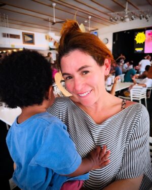 Yael Stone Instagram - Reunited. My dear friend @uzoaduba - how I have missed you. See the little hands clinging to our bodies, outside the frame of this photo is real life. How we have grown, how we have changed, we are both mothers now and the things we loved in each other have deepened. And that is the fruit of a long friendship. For your beautiful baby to reach out to me for a cuddle was the very best gift of the first day of this new year. All I know for sure is that love and connection are at the centre of it all, now are forever that is my wish for us all. ❤️