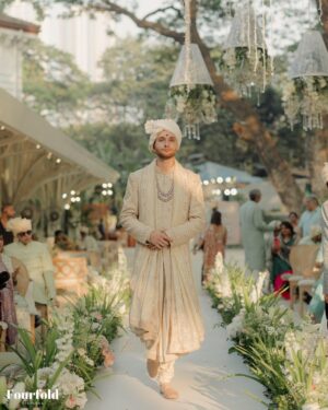 Aaliyah Kashyap Instagram - 𝗧𝗧 𝗕𝗥𝗜𝗗𝗘 𝗔𝗡𝗗 𝗚𝗥𝗢𝗢𝗠 - 𝗔𝗔𝗟𝗜𝗬𝗔𝗛 𝗞𝗔𝗦𝗛𝗬𝗔𝗣 & 𝗦𝗛𝗔𝗡𝗘 𝗚𝗥𝗘𝗚𝗢𝗜𝗥𝗘

When we met Aaliyah Kashyap (@aaliyahkashyap) and Shane Gregoire (@shanegregoire) , their exuberance shone through and we knew we had to craft for them something that let their inner light shine. We celebrate their love with timeless artistry and intricate craftsmanship on their wedding day.

Aaliyah stuns in our Bloom Couture lehenga, featuring a lace-embroidered jaal enriched with blooming floral hues, detailed kasab work, and intricate zardozi accents. The scalloped lace border on the hem and the signature trail are beautifully complemented by a statement TT blouse and a delicate drape adorned with 3D floral highlights.

Shane, looks ever charming in our classic TT sherwani, showcasing intricate multi-coloured silk thread embroidery, embellished with pearls and sequins.

We wish both Aaliyah and Shane a harmonious and joyful union.

Stylist: @sheefajgilani 

#TarunTahiliani #TTBride #TTGroom