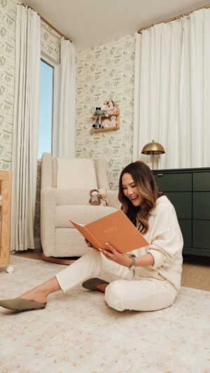 Ally Maki Instagram - Discover @allymaki’s nursery inspired by her grandmother’s garden and sentimental pieces from her own childhood.

The beautifully balanced design features a soothing natural palette, a subtle garden-inspired wallpaper from @chasingpaper, and a few Babyletto essentials: the Yuzu Crib in Natural, the Kiwi Recliner in Almond Teddy Loop, and the Bondi Dresser in Forest Green. Every little detail is chic, cozy, and effortless. 🤍✨