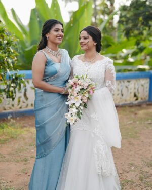 Amrutha Saju Instagram - Finally! My sister has turned into a beautiful bride! I can’t believe she has grown up so fast. I still remember her tiny little face, calling me Ammu all the time, asking me this and that. Our little fights, the tears, and the happiness.Everything feels like just yesterday. And now, all of a sudden, she stands before me, a grown, mature woman, stepping into a new life with her love🤍

With her wedding, we celebrate her new journey and also welcome a new member into our family 

All my blessings to my sweet little one and her husband🤍 @aparna__alappattu_ & @su_tt_uz