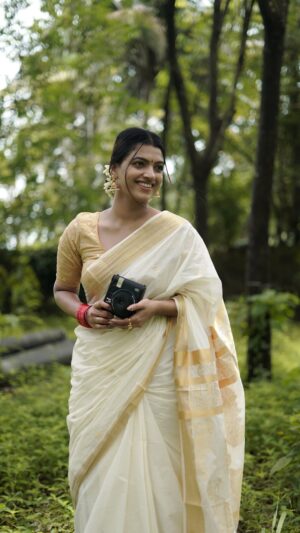 Amrutha Saju Instagram - Celebrating Onam moments with a click and a smile, thanks to @Instaxindia. Every snap is a timeless memory. From the vibrant pookalam to the joyous sadya, every frame tells a story of love, tradition, and togetherness. 

With Instax Mini 99, each picture brings back the festive spirit, keeping Onam memories alive for years to come. Here’s to cherishing the little moments that make this festival special! 

#onamcelebrations #instaxindia #instax #instaxmini99 

🎥✂️ @momentdefiner._