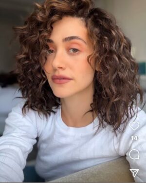 Emmy Rossum Instagram - Warm brown highlights on @emmy .
Subtle highlights give curly hair some soft contrast and dimension. Haircolor by me.