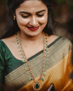Haritha G Nair Instagram - 🌻candids🌻
.
Costume : @canisaperidotclothing 
Ornaments : @canisaperidot 
MUA, Hair & Saree draping : @pink__passion_ 
Photography : @i_magics_photography_ 
.
#saree #SareeLove #IndianBeauty #TraditionalWear #GoldenSaree #DesiQueen #EthnicVibes #SareeNotSari #IndianCulture #graceful #elegantlook #FestiveMood #stylewithtradition #royalvibes