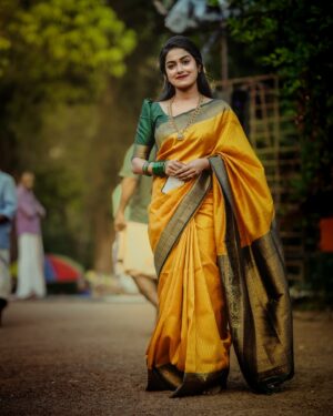 Haritha G Nair Instagram - 🌻🌻🌻
.
Costume : @canisaperidotclothing 
Ornaments : @canisaperidot 
MUA, Hair & Saree draping : @pink__passion_ 
Photography : @i_magics_photography_ 
.
#saree #SareeLove #IndianBeauty #TraditionalWear #GoldenSaree #DesiQueen #EthnicVibes #SareeNotSari #IndianCulture #graceful #elegantlook #FestiveMood #stylewithtradition #royalvibes