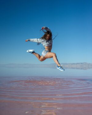 Jade Chynoweth Instagram - Leaping where salt meets sky—introducing my new sneaker, the Blue Jades. Simplicity and flow inspired by water. Weightless, comfortable, and elemental 
Jade X @fuego.dance
Each pair uses 5 recycled plastic bottles to create the fabric, plus with every purchase of a pair of Blue Jades, our partner company @plasticbank , will remove an additional 5 plastic bottles from our oceans! 
Get Yours Today at Fuegodance.com
 #BlueJades #FlowInStyle
Shot by 📸 @thedaoist