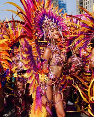 Jourdan Dunn Instagram - Carnival Chronicles 🩷🧡💛💜

Costume design @eccdesigner 
Band @ucomcarnival 
📸 @luceroglow