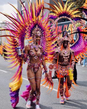 Jourdan Dunn Instagram - Carnival Chronicles 🩷🧡💛💜

Costume design @eccdesigner 
Band @ucomcarnival 
📸 @luceroglow