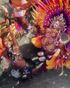 Jourdan Dunn Instagram - Carnival Chronicles 🩷🧡💛💜

Costume design @eccdesigner 
Band @ucomcarnival 
📸 @luceroglow