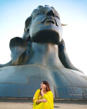 Kanisha Malhotra Instagram - Hi world, meet my spirit God- Adiyogi, a representation of Shiva, the first yogi and source of yoga. 
Adiyogi Shiva is a 112-foot tall sculpture located at the Isha Yoga Center in Coimbatore, Tamil Nadu, India. It is the world’s largest bust sculpture, according to Guinness World Records. Thankyou @isha.foundation @sadhguru for making this beautiful moment possible. I am in awe and still mentally there. Hoping to visit him soon ♥️🙏😇
P.S.- Shiva found me when I needed him to most & took steering of my life in his hand. I am forever grateful and in debt. 
@adiyogi.official 

Har Har Mahadev 💫✨

#ishayogacentre #adiyogi #spiritgod #spirituality #spiritual #mentalwellness #spiritualawakening #shiva #mahadev #kanishamalhotra
