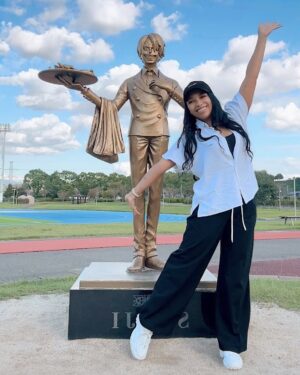 Mica Burton Instagram - This is a bit of a long post, but bear with me; I put a lot of love into it 🩷. If you’ve been following me for more than 5 minutes, you’ll know that I like One Piece. I don’t have the time (or character limit) to go into detail about how formative the series is for me and has touched my heart blah blah blah. So for my next “belated Japan posting” installment, ONE PIECE ADVENTURES!

I purposely planned my trip to be able to celebrate one of my favorite character’s— Trafalgar Law— birthday! I spent the day hanging out with other Law fans in Shibuya, language barrier be damned. I went to about 5 Mugiwara stores (and spent an amount of money on merch and figurines I’m ashamed to admit), went to the One Piece museum only 2 days after it opened where they displayed every page of the manga from chapter 1-1100, but best of all, I did the “One Piece pilgrimage”. 

The creator of the manga, Eiichiro Oda, was born in Kumamoto Japan. Around the prefecture there are large bronze statues placed in many different locations as a part of a project to help Kumamoto recover from an earthquake with a generous donation from Oda. So like many fans, I took a 7 hour bullet train trip to Kumamoto, bought my first straw hat, spent ~7 hours getting to as many statues as I could (only 5/10 but they’re some of my fave crew members), slept one night in a ryokan, then travelled home the next day. The only reason I could see so many is because of an INCREDIBLE taxi driver that asked via a translator if I planned to see the other statues, and offered to take me to as many as he could, cutting the meter when I got out to take pictures. He didn’t speak a word of English and I’m nowhere near conversational, so we chatted for hours via an app and I cried from how grateful I was when he dropped me at my hotel.

So, all this to say, my One Piece adventures were amazing. Not just because of the merch and themed things, but because this franchise literally transcended language barriers so strangers could all enjoy something we care about.

If you read all of this, I love you. Go watch One Piece. The content is worth the time.