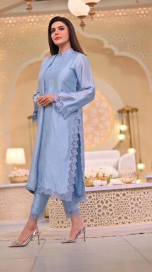 Nida Yasir Instagram - Cornflower blue silk shirt and pants with soft cotton net duppatta and cutwork embroidery on shirt and pants perfect for elegant look
@ynida.clothing 
@officialmagnifique_