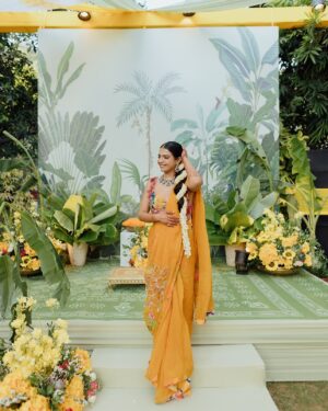 Nishtha Gandhi Instagram - When pictures speak louder than a thousand words 📸 - only in an Indian wedding! 

Couple wearing @rishiandvibhuti 
Design @nishchaygandhidesigns 
Photography @weddingrams 
Planning @riwaazerishte 
Makeup @makeupbyvidushi 
Floral jewellery @shinestonefloraljewellery 
Footwear @prankit_creations 
.
.
.
#haldiceremony #haldidecor #haldifunction #indianweddinginspiration #weddingideasbrides #haldiphotography #realweddingmoments #indiancouples #southindianfashion