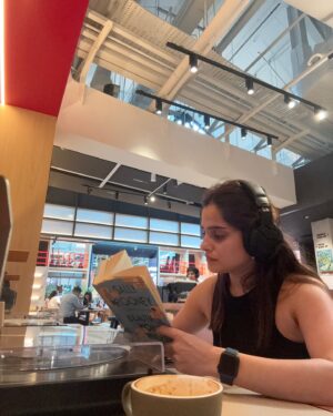 Priya Bapat Instagram - Doing what I like the most 📖☕️🎧 

#sweeleemusiccompany #singapore #clarkyquay