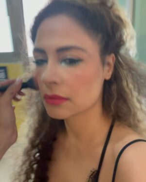 Yasmine Al Massri Instagram - Creating characters.. my favorite part.. THANK YOU FOR BANKING WITH US… is starting to get worldwide releases, I hope u guys will see it soon 🫂 #bighair #dontcare @ohoodjaghoub  @fouad_hair_extensions #palestiniancinema 🎥………