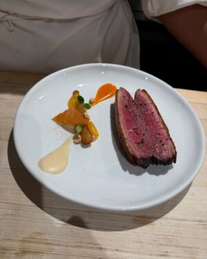 Adrienne Cheatham Instagram - Tuesday night was magical! (And made me miss being in restaurants 🥲) I’m so honored to have been a part of this event for the @jacquespepinfoundation and @beardfoundation sharing a kitchen with @lerouxeddy @danielboulud @chefgabrielkreuther @jacquestorres 

Our host @marvasmalls brought together an incredible group of people around the table that are all excellence personified and it was an honor to cook for them (during Black History Month no less). 
Sharing space with the chefs from all the teams, working collaboratively and seeing how much we all have in common was a joy. A special THANK YOU to @lana_cooks for coming straight from the airport to be there with me making sure things went smoothly, @jbfizabela for running the evening so well, and the great students from @iceculinary Abe, Nyaira, and Marven who came with open minds and good vibes to assist and soak up the experience. 

***For those of you who voted in the outfit poll, I went with Option 3 - the blue work jacket look for prep and set up, then did a costume change for service into Option 1 - the classic, crisp white jacket and apron! It felt right and was perfect for the situation. 

#chef #cheflife #jamesbeardhouse #blackhistorymonth